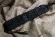 Нож Kizlyar Supreme Alpha, AUS-8, gt v2 серый титан, черная рукоять, черные ножны/camo ножны